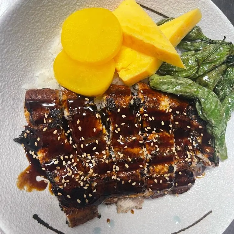 Shin Sushi-Japanese-restaurant-Unagi-Don-Pleasant-Hill Unagi Don Grilled eel with rice, veggies and sesame at Shin Sushi, a Japanese restaurant in Pleasant Hill